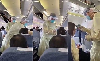 Çin'de, Uçaktaki yolculara virüs taraması yapıldı